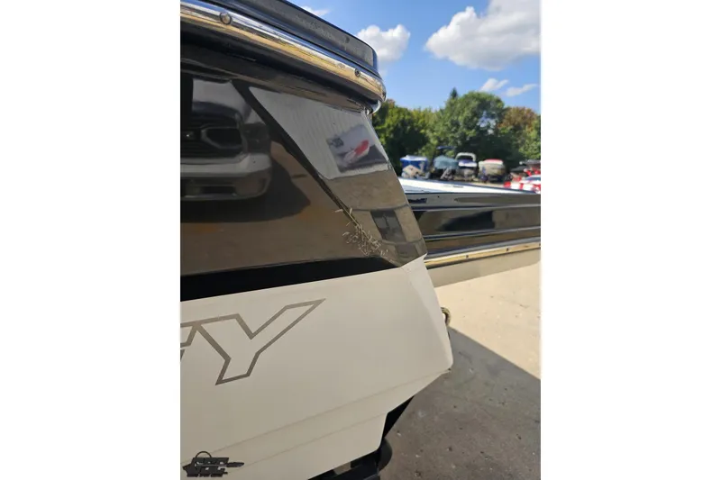 Slide: The Image of Close-up of 2018 Monterey 238SS Super Sport boat rear, showing sleek design and logo. - 28
