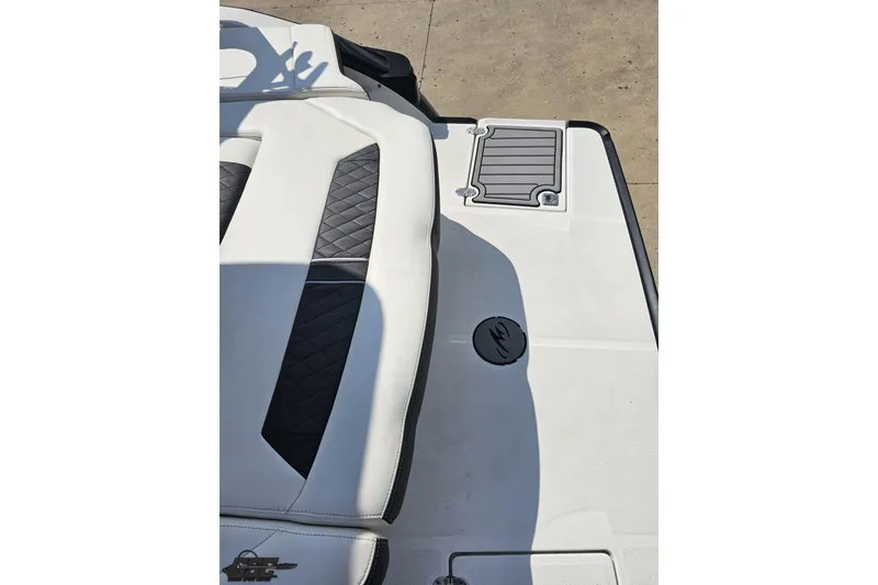 Slide: The Image of 2018 Monterey 238SS Super Sport boat deck with white and black seating. - 29