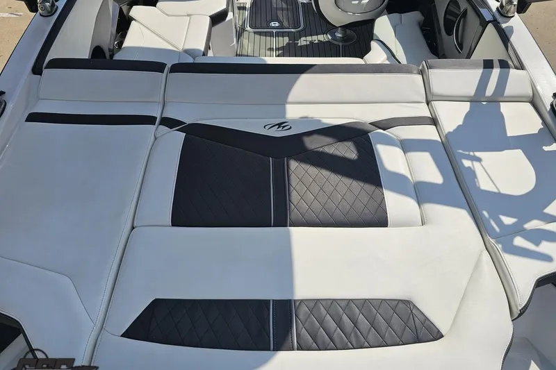 Slide: The Image of 2018 Monterey 238SS Super Sport boat interior with sleek, modern seating design. - 31
