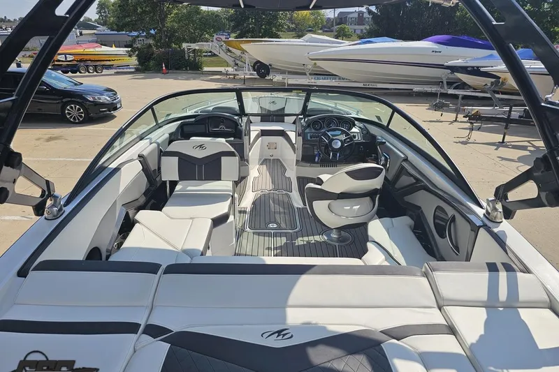Slide: The Image of 2018 Monterey 238SS Super Sport boat interior with sleek seating and modern dashboard. - 32