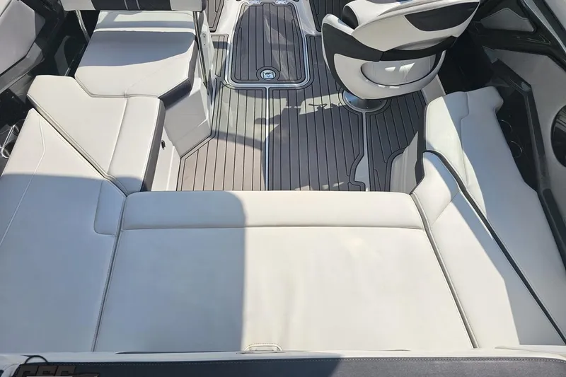 Slide: The Image of Interior of 2018 Monterey 238SS Super Sport boat with white seating and sleek design. - 37
