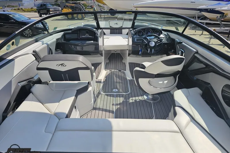 Slide: The Image of Interior of a 2018 Monterey 238SS Super Sport boat with sleek seating and modern dashboard. - 38
