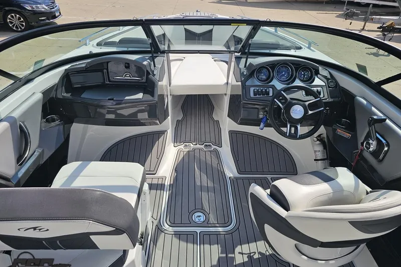Slide: The Image of 2018 Monterey 238SS Super Sport boat interior with sleek dashboard and seating. - 39