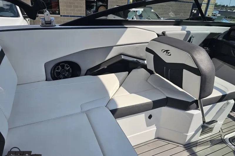 Slide: The Image of 2018 Monterey 238SS Super Sport boat interior with white and black seating. - 42