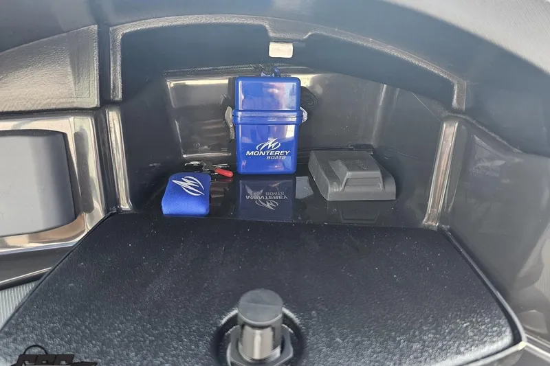 Slide: The Image of Dashboard compartment of 2018 Monterey 238SS Super Sport with branded accessories. - 47