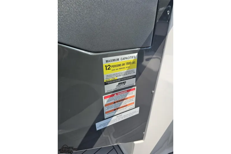 Slide: The Image of 2018 Monterey 238SS Super Sport capacity label, maximum 12 persons or 1980 lbs. - 55