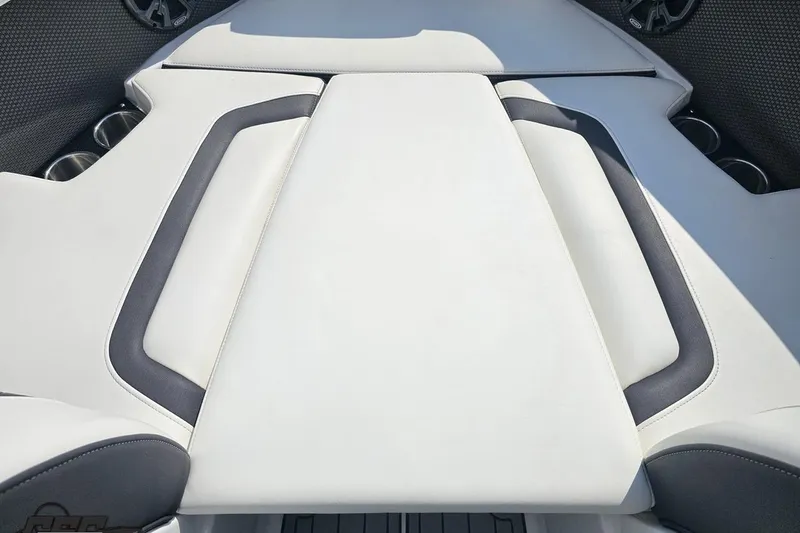 Slide: The Image of 2018 Monterey 238SS Super Sport boat interior with white and gray seating. - 58