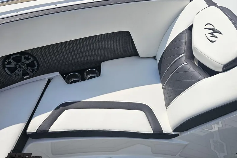 Slide: The Image of Luxurious seating in 2018 Monterey 238SS Super Sport boat with speaker and cup holders. - 61