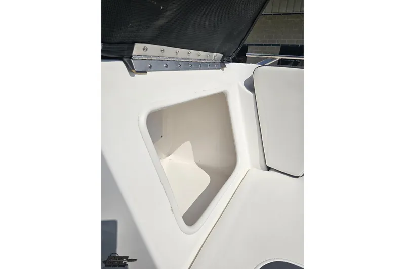 Slide: The Image of 2018 Monterey 238SS Super Sport boat interior storage compartment. - 64