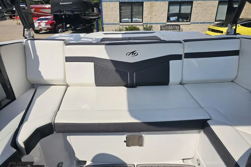 Slide: The Image of 2018 Monterey 238SS Super Sport boat interior with white and black seating. - 69