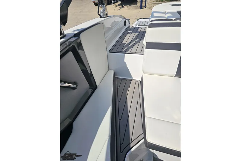 Slide: The Image of 2018 Monterey 238SS Super Sport boat interior with sleek white and gray seating. - 72