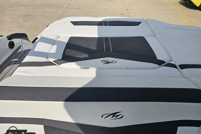 Slide: The Image of 2018 Monterey 238SS Super Sport boat interior with stylish upholstery and logo detailing. - 77