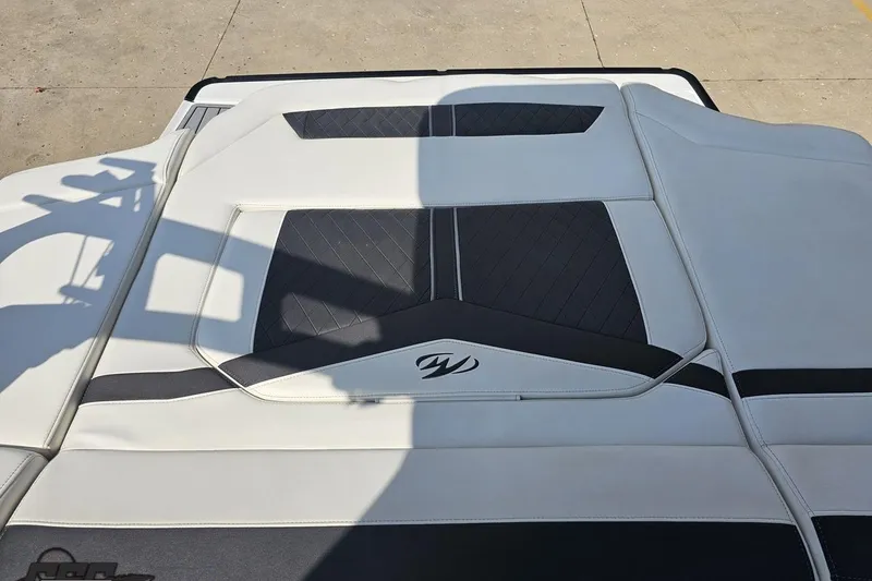 Slide: The Image of 2018 Monterey 238SS Super Sport boat upholstery with sleek black and white design. - 78