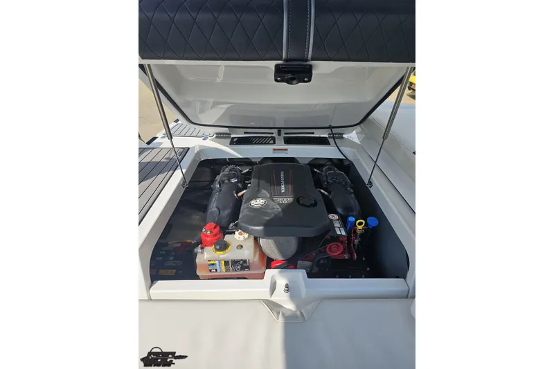 Slide: The Image of 2018 Monterey 238SS Super Sport boat engine compartment with open hatch. - 79