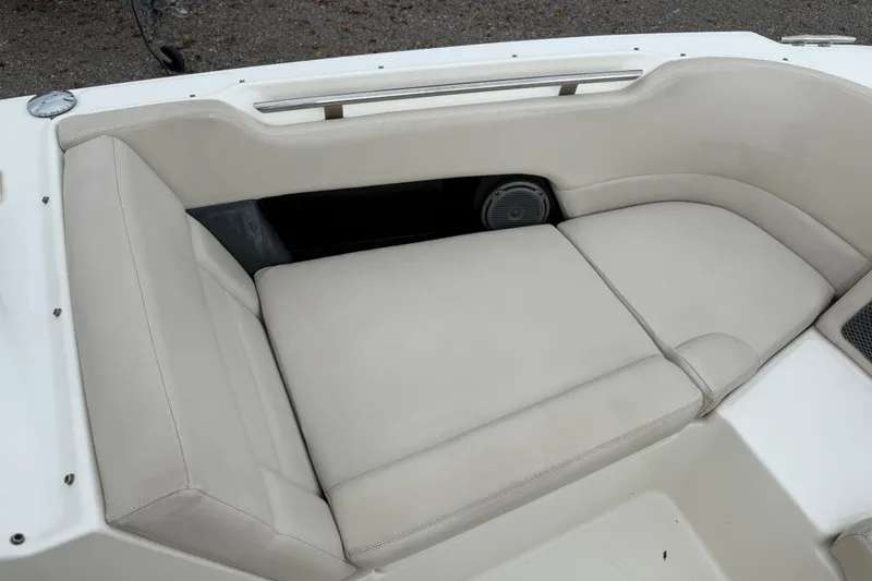 Slide: The Image of 2019 Boston Whaler 230 Vantage boat interior with compact marine toilet and sink. - 13