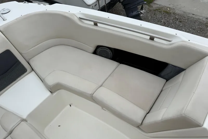 Slide: The Image of 2019 Boston Whaler 230 Vantage helm with steering wheel and navigation display. - 14