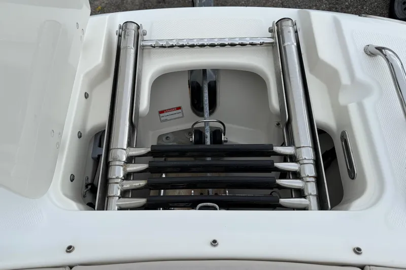 Slide: The Image of 2019 Boston Whaler 230 Vantage boat interior with steering wheel and controls. - 15