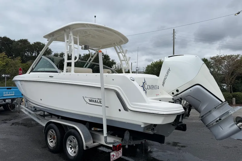 Slide: The Image of 2019 Boston Whaler 230 Vantage boat cruising on calm waters. - 3