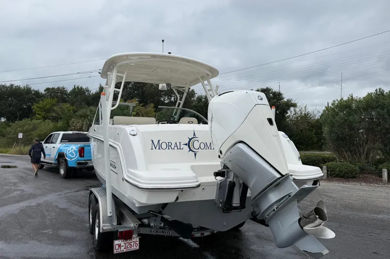 Slide: The Image of 2019 Boston Whaler 230 Vantage boat cruising on open water. - 4
