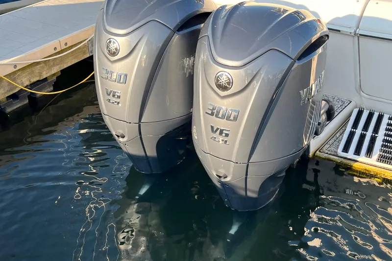 Slide: The Image of Twin Yamaha 300 V6 outboard engines on a 1994 Pro-Line 2950 boat. - 13