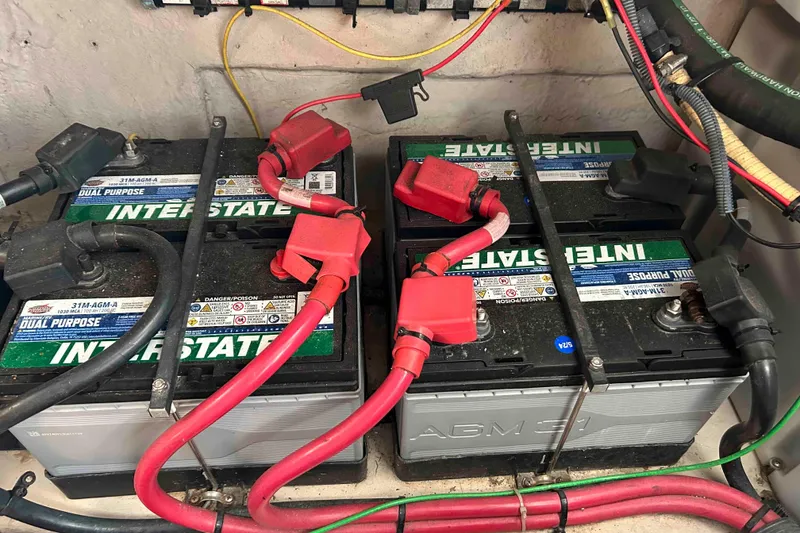 Slide: The Image of Batteries in a 2008 Sea Ray 38 Sundancer boat engine compartment. - 16