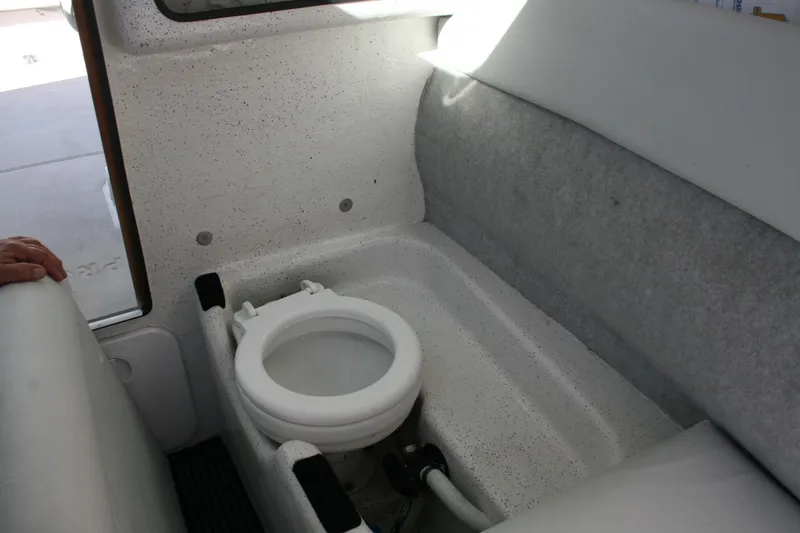 Slide: The Image of Interior view of a 2012 Protector Targa 30 boat's electrical compartment. - 13