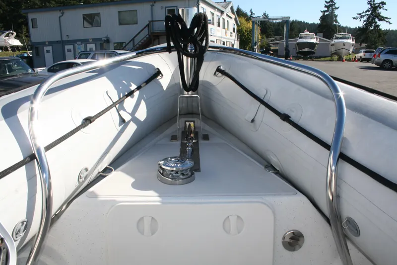 Slide: The Image of 2012 Protector Targa 30 boat electrical compartment with ProSport charger. - 17