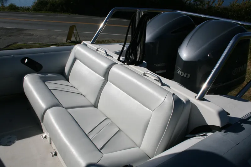 Slide: The Image of 2012 Protector Targa 30 boat bow with stainless steel railings and winch. - 18