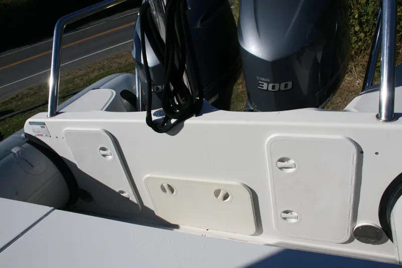 Slide: The Image of 2012 Protector Targa 30 boat with dual engines and white seating. - 20