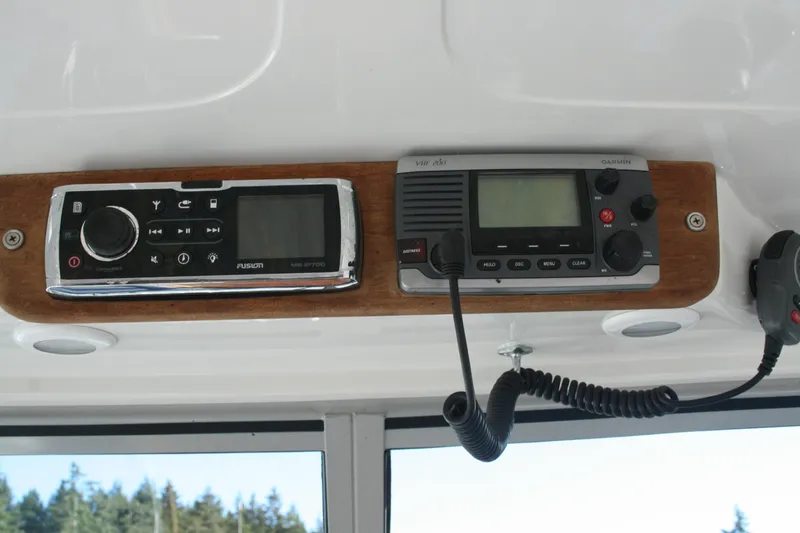 Slide: The Image of Overhead radio and speaker system in 2012 Protector Targa 30 boat. - 3