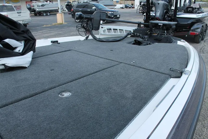 Slide: The Image of 2026 Skeeter FXR21 FLEX boat interior with advanced steering and navigation system. - 5