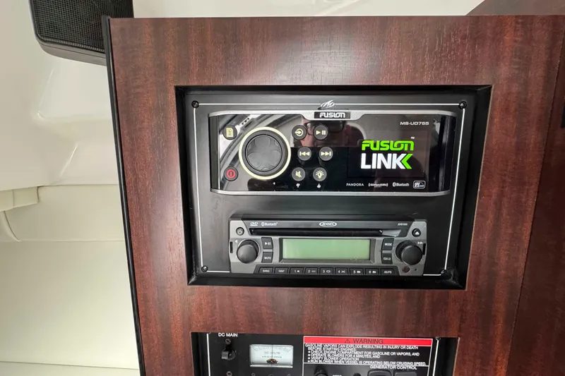 Slide: The Image of Fusion stereo system on 2019 Monterey 295 Sport Yacht dashboard. - 21