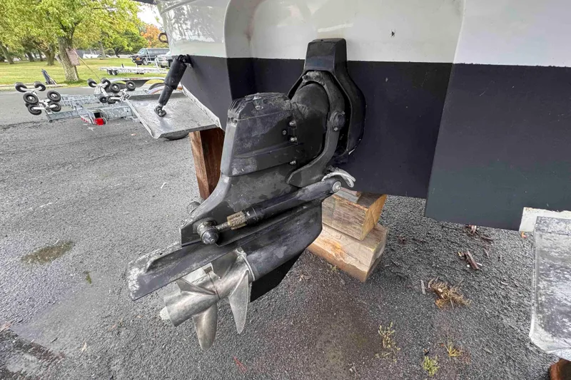 Slide: The Image of 2019 Monterey 295 Sport Yacht outdrive and propeller on a trailer. - 25