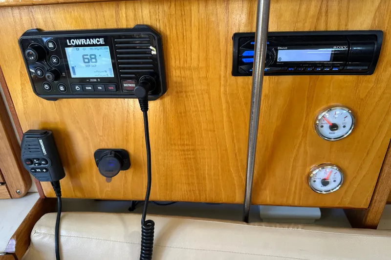 Slide: The Image of Control panel of a 1995 Catalina 320 sailboat with radio and gauges. - 41