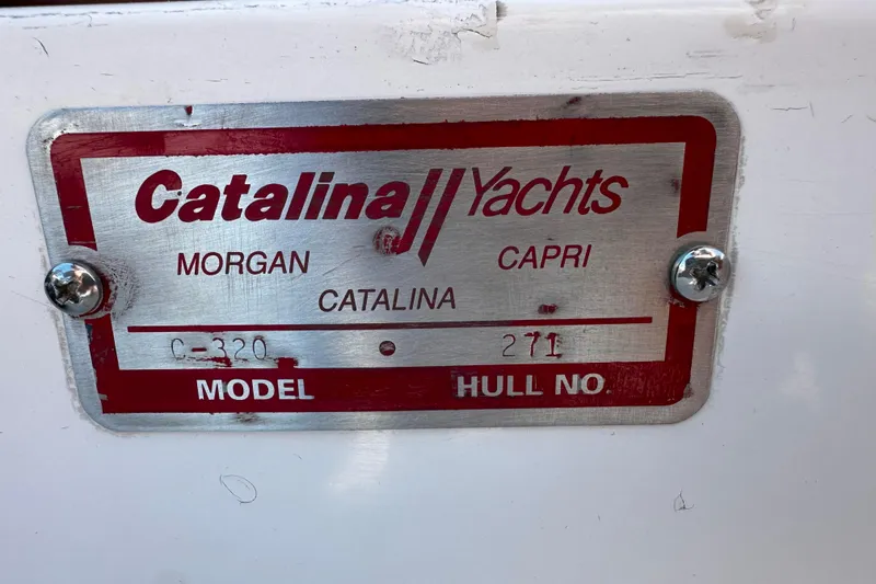 Slide: The Image of Plaque of a 1995 Catalina 320 yacht, model C-320, hull number 271. - 46