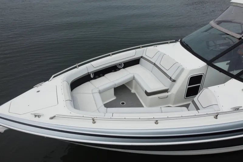 Slide: The Image of 2020 Formula 350 Crossover Bowrider with spacious seating on calm water. - 16