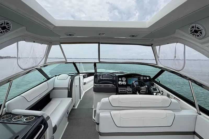 Slide: The Image of 2020 Formula 350 Crossover Bowrider interior with luxurious seating and modern dashboard. - 22