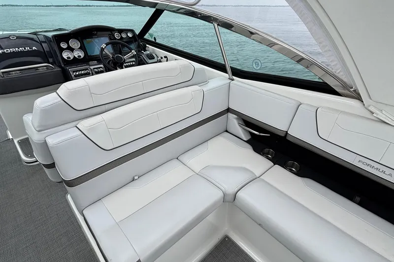Slide: The Image of 2020 Formula 350 Crossover Bowrider interior with luxurious seating and modern dashboard. - 25
