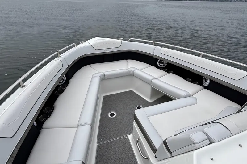 Slide: The Image of 2020 Formula 350 Crossover Bowrider with spacious seating on calm water. - 29