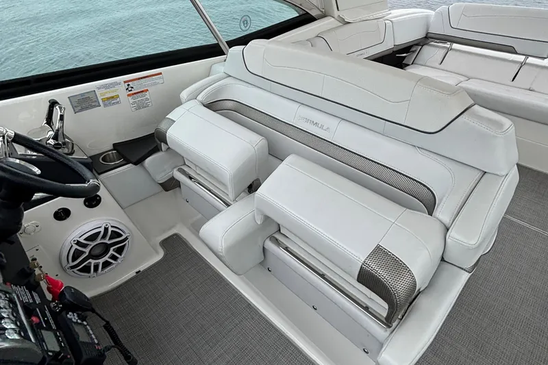 Slide: The Image of 2020 Formula 350 Crossover Bowrider interior with luxurious white seating and modern controls. - 34
