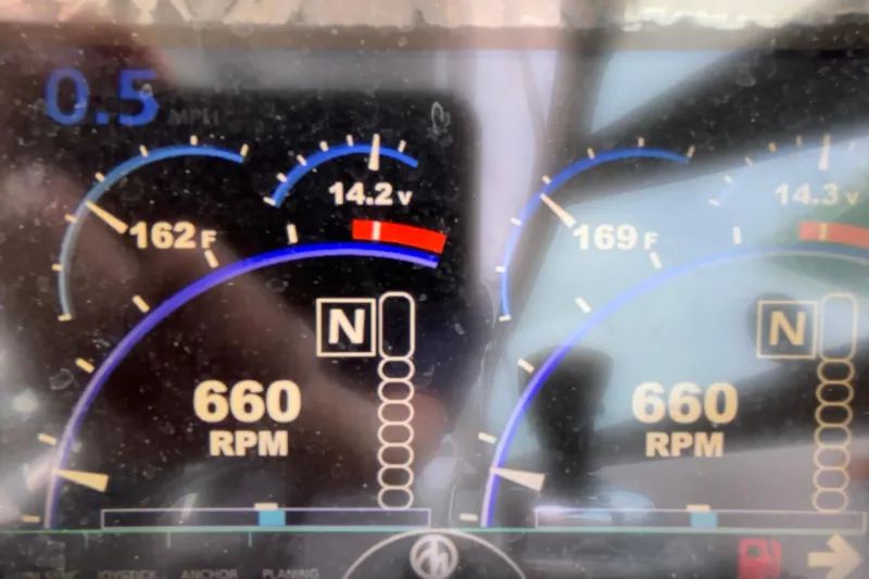 Slide: The Image of Dashboard of 2020 Formula 350 Crossover Bowrider showing RPM, temperature, and voltage. - 38