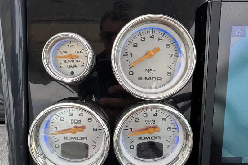 Slide: The Image of Dashboard gauges of a 2020 Formula 350 Crossover Bowrider boat. - 40