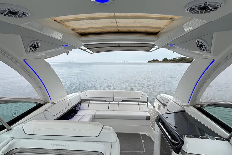 Slide: The Image of 2020 Formula 350 Crossover Bowrider interior with luxurious seating and panoramic water view. - 54