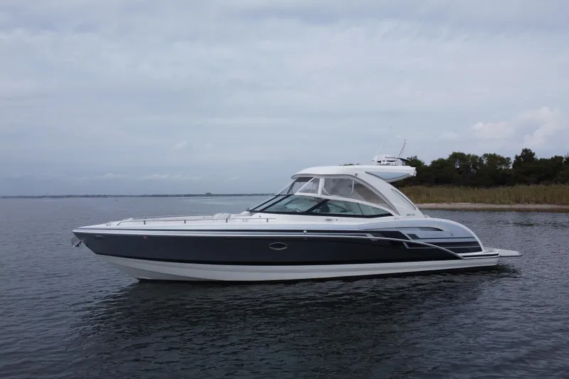 Slide: The Image of 2020 Formula 350 Crossover Bowrider on calm water, side view. - 63