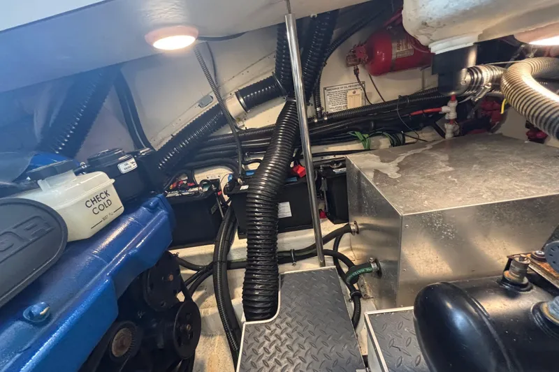 Slide: The Image of Engine compartment of 2020 Formula 350 Crossover Bowrider with visible components and wiring. - 71