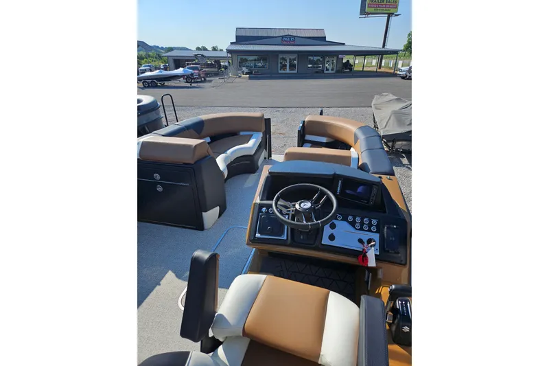 Slide: The Image of 2026 Trifecta 23 ULESS boat interior with modern dashboard and seating. - 19