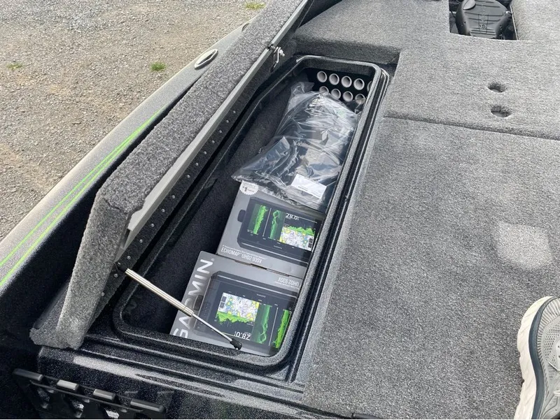 Slide: The Image of Phoenix Pro Series 818 boat with storage compartment and Garmin Echomap. - 17