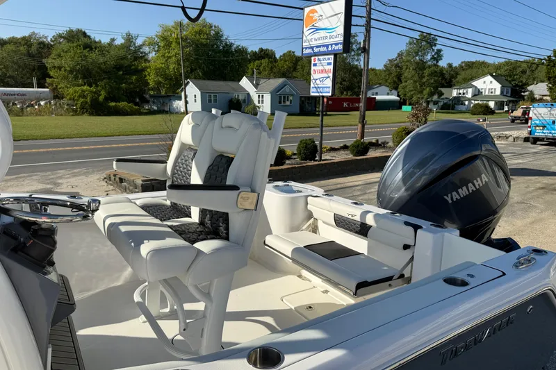 Slide: The Image of 2026 Tidewater 232 CC Adventure boat with Yamaha engine, featuring comfortable seating and modern design. - 17