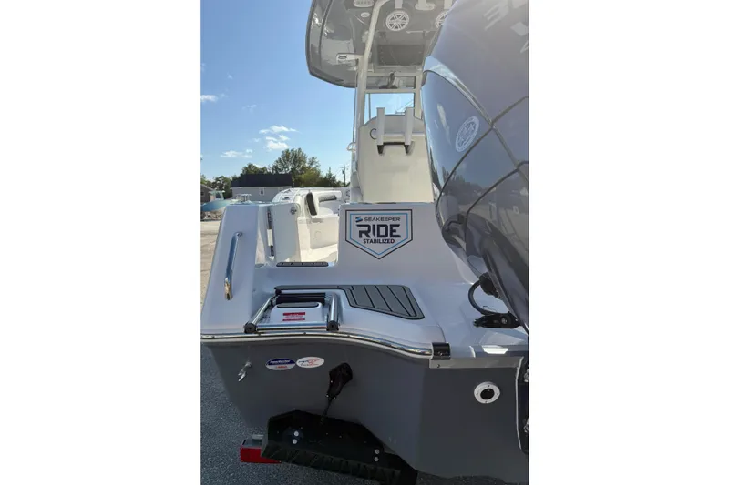 Slide: The Image of 2026 Tidewater 232 CC Adventure boat with Seakeeper Ride stabilization system. - 2