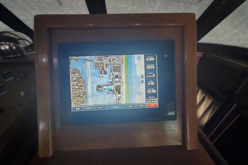 Slide: The Image of Navigation screen on 1981 Hatteras 56 Motor Yacht displaying a detailed map. - 12